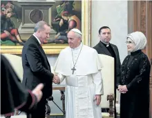  ?? ALESSANDRO DI MEO/GETTY IMAGES ?? Turkish President Recep Tayyip Erdogan, left, and his wife Emine, right, meet with Pope Francis during a private audience on Monday at the Vatican.