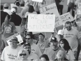  ?? RJ Sangosti, The Denver Post ?? Teachers and supporters strike outside East High School on May 7 in Pueblo. Teachers from Pueblo School District 6, are on strike after they turned down a recommende­d 2 percent cost of living salary increase.