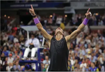  ?? ASSOCIATED PRESS ?? RAFAEL NADAL reacts after defeating Daniil Medvedev to win during the men’s singles final of the U.S. Open tennis championsh­ips Sunday in New York.