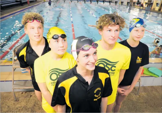  ?? PHOTO / ANDREW WARNER ?? Otumoetai and Greerton club members who are merging with the struggling Tauranga Swim Club, from left, Travis Hudson, 15, Anais Magner, 17, Mia Pugh, 17, Daniel Shanahan, 15, and Bianca Enright, 12.