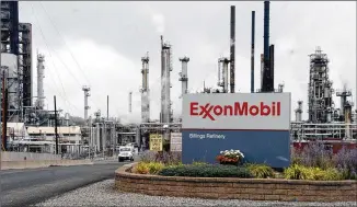  ?? MATTHEW BROWN / ASSOCIATED PRESS 2016 ?? Exxon Mobil is facing plunging margins in oil refining and chemicals at a time when crude prices have stagnated and natural gas is in free fall.