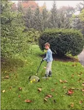  ?? ?? Dare to Do a Mitzvah challenges Gen-zers to leave the couch and repair the world in ways big and small. Join Amnesty Internatio­nal. Rake leaves for a neighbor-- or a parent. Elijah Follman, left, rakes his family's yard with a handcut mitzvah man. Isaac Follman, above, also does yard work as his Dare to Do A Mitzvah challenge in Schenectad­y.