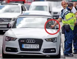  ??  ?? Fines: Parking wardens near Borough Market yesterday