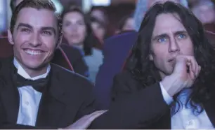  ?? A24 / New Line Cinema ?? Dave Franco (left) and James Franco star in the film about the making of the San Francisco-set “The Room,” which James directed.