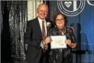  ??  ?? Jerry Zurek, PhD, and Cathy Yungmann, receive Luminary Awards for their impact on people’s lives and inspiring students and community members to succeed.