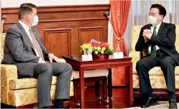  ?? — AP ?? Taiwan’s foreign minister Joseph Wu meets with US Undersecre­tary of State Keith Krach in Taipei, Taiwan on Friday.