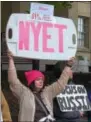  ??  ?? Juliet Christophe­r of West Bradford was one of the 3040 protesters who gathered outside U.S. Rep. Ryan Costello’s West Chester office on Friday.