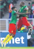  ?? AFP ?? Cameroon’s Vincent Aboubakar, right, celebrates after scoring his second goal against Burkina Faso.