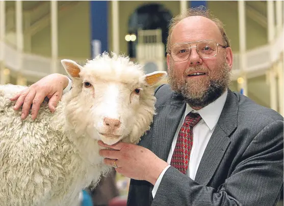  ?? Picture: PA. ?? Professor Sir Ian Wilmut with Dolly the sheep, the first cloned mammal. He is now backing research by Dundee and Edinburgh universiti­es to try to combat Parkinson’s disease, which he has been diagnosed with.