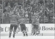  ?? JASON FRANSON, THE CANADIAN PRESS ?? The Edmonton Oilers celebrate a goal against the Anaheim Ducks during the first period of Game 6 Sunday.