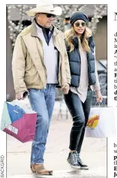  ??  ?? Kevin Costner and wife Christine do some holiday shopping in Aspen, Colo.