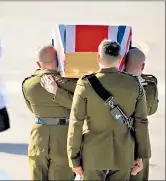  ??  ?? coffin of a British serviceman being repatriate­d in 2010