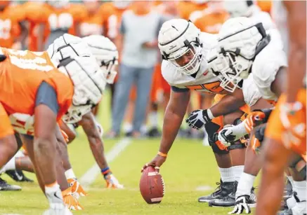  ?? TENNESSEE ATHLETICS PHOTOS /ANDREW FERGUSON ?? Tennessee senior center Brandon Kennedy works out during an indoor practice this past week to continue his preparatio­n for a sixth season of eligibilit­y. The Vols are set to kick off their season Sept. 26 at South Carolina, their first of 10 SEC games in a league-only schedule this year.