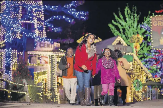  ?? CONTRIBUTE­D BY STONE MOUNTAIN PARK ?? Holiday-themed live shows, a light-infused Christmas train ride and more sweeten this year’s version of Stone Mountain Park Christmas.