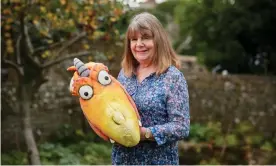  ??  ?? Julia Donaldson at home in the summer with Zog, the accident-prone dragon from her 2010 book. Photograph: David Levene/The Guardian