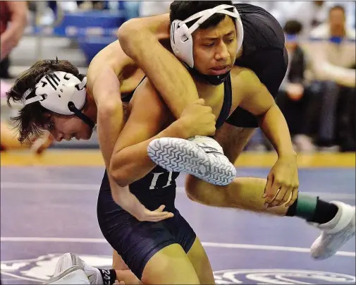  ?? KYLE FRANKO — TRENTONIAN FILE PHOTO ?? Hopewell Valley’s Allen Lopez, bottom, won his 126-pound bout against Nottingham on Wednesday.