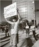  ?? KarenWarre­n / Staff Photograph­er ?? Members of the Protect The Results coalition hold a protest Monday against Sen. Ted Cruz at Mickey Leland Federal Building in Houston.