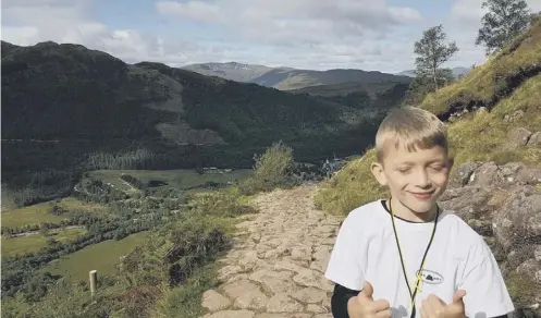  ??  ?? 0 Caeden Thomson, from Corby is Northampto­nshire, described the climb as ‘really, really hard’