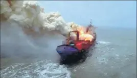  ?? PHOTO COURTESY: IAF ?? The cargo ship had been on fire since last Wednesday off the West Bengal coast.