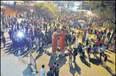  ?? ANI ?? Protesters gather around a replica of the India Gate set up at Shaheen Bagh in New Delhi, on Tuesday.