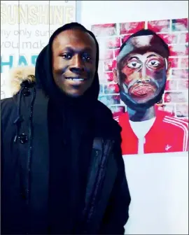  ??  ?? Stormzy with the painting purchased from Gayle Hiller