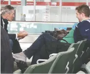  ?? THE CANADIAN PRESS ?? Conservati­ve Leader Andrew Scheer, right, and Manitoba Premier Brian Pallister not wearing masks at Toronto’s Pearson Airport.