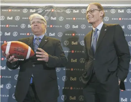  ?? JACK BOLAND/FILES ?? Jim Popp, left, and Marc Trestman meet with the press in Toronto on Feb. 28. The general manager and head coach joined the Toronto Argonauts well into the CFL’s most recent off-season, but they found a way to win the East Division and get the team...