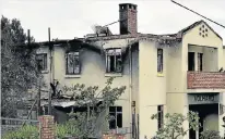  ?? Picture: EUGENE COETZEE ?? BURNT-OUT SHELL: Knysna High School’s Volhard hostel was completely ruined