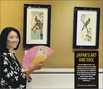  ?? PICTURE: GARY LONGBOTTOM ?? Hiromi Willard from The Japanese Shop in Harrogate is pictured in front of prints in a Japanese art exhibition at the Bath House at Harlow Carr Gardens in Harrogate which opens today. The exhibition runs until February 7.