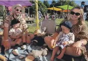  ?? LISA BURD/STUFF ?? Stephanie Ockhuysen and her husband, Will, with their children Theo, 3, and Ruthie, 1, at the Womad NZ festival on Saturday.