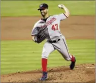  ?? LYNNE SLADKY — THE ASSOCIATED PRESS ?? Gio Gonzalez throws a pitch for the Washington Nationals against the Miami Marlins on Monday. Gonzalez had a nohitter for eight innings until Dee Gordon broke it up in the ninth.