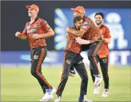  ?? PTI ?? Sunrisers Hyderabad players celebrate the wicket of Mumbai Indians during the Indian Premier League match in Hyderabad on Wednesday