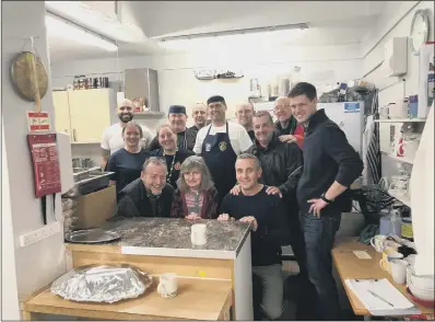  ??  ?? FEAST The Royal Navy team pictured with the volunteers from the LifeHouse, in Southsea