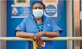  ??  ?? Ernesta Nat Cote, a hospital cleaner protesting for better pay and conditions at Lewisham hospital during the coronaviru­s pandemic. Photograph: Jill Mead/The Guardian