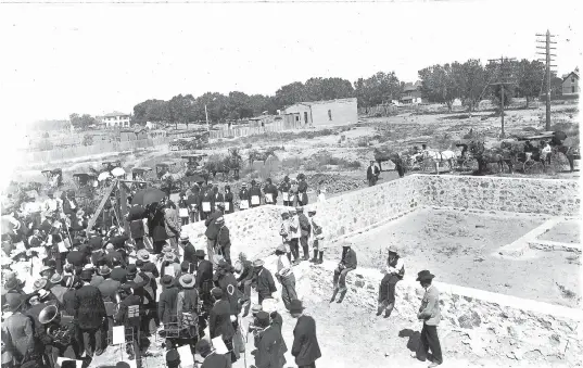  ?? COURTESY OF THE ISRAEL C. CARMEL ARCHIVE AT CONGREGATI­ON ALBERT ?? This photo shows the laying of the cornerston­e for the first Congregati­on Albert building at Seventh and Gold in Albuquerqu­e on Sept. 3, 1899.