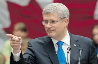  ?? ANDREW VAUGHAN/The Canadian Press ?? Prime Minister Stephen Harper takes a question as he attends an event at the Confederat­ion Centre of the Arts, in Charlottet­own in June. Andrew Coyne argues that prime ministers have little impact on the short-term future of the economy.