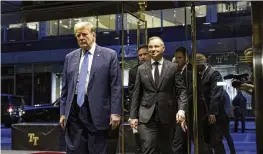  ?? STEFAN JEREMIAH / AP ?? Republican presidenti­al candidate
former President
Donald Trump walks with Poland’s
President Andrzej Duda at Trump Tower in midtown Manhattan in New York on Wednesday.