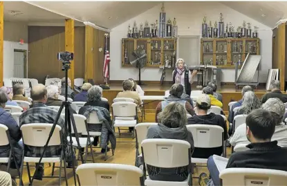  ?? BY JULIA SHANAHAN ?? The Sperryvill­e Community Alliance held an informatio­nal meeting on Monday to answer questions from residents about a potential expansion of the village’s historic district.