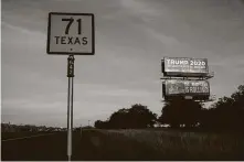  ?? Tamir Kalifa / New York Times ?? Trump billboards rise above the trees along Texas 71 near La Grange. Attorney General Ken Paxton’s suit seeking to discount votes was drafted by lawyers close to Trump, the Times found.