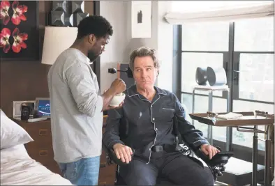  ?? David Lee / STXfilms / Associated Press ?? Kevin Hart, left, and Bryan Cranston in a scene from “The Upside.”