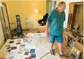  ?? ?? Mike Ford, whose home was flooded by Hurricane Ian, stands inside his residence Oct. 9 in Fort Myers, Fla.