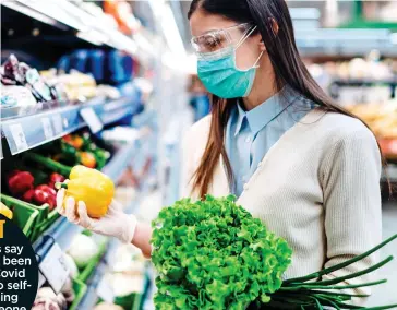  ??  ?? PERFECT TRANSMISSI­ON POINT: Shops can be a place where the virus lingers but you’re more likely to catch Covid at the checkout than by touching food