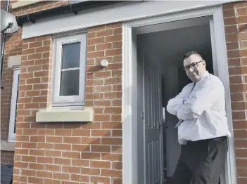  ??  ?? Michael Duncan at his home in Hampton Gardens