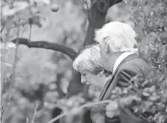  ?? JONATHAN ERNST, AP ?? President Trump talks to British Prime Minister Theresa May at the G- 7 Summit in Taormina, Sicily, Italy, last month.