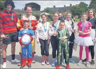  ??  ?? Pupils of Barwell CE Academy past and present were joined by parents, grandparen­ts, siblings and friends for a Race for Life fundraisin­g event which raised more than £2,540 for Cancer Research UK, June 2017.