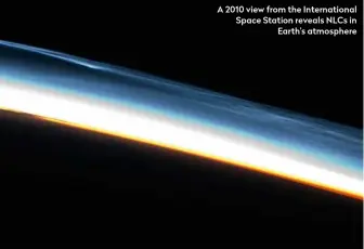  ??  ?? A 2010 view from the Internatio­nal Space Station reveals NLCs in Earth’s atmosphere