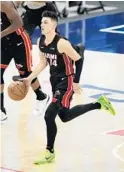  ?? NICK WASS/AP ?? Heat guard Tyler Herro dribbles the ball against the Wizards on Jan. 9 in Washington.