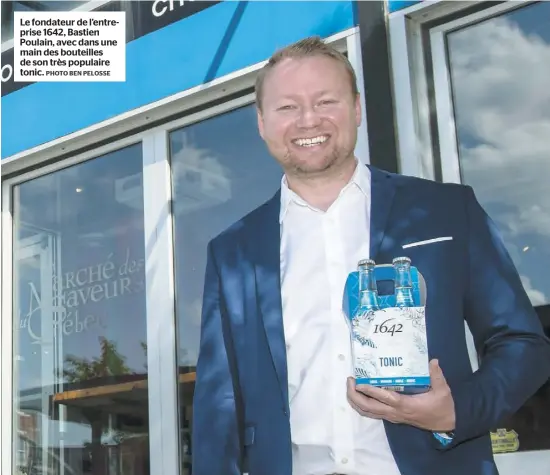  ?? PHOTO BEN PELOSSE ?? Le fondateur de l’entreprise 1642, Bastien Poulain, avec dans une main des bouteilles de son très populaire tonic.