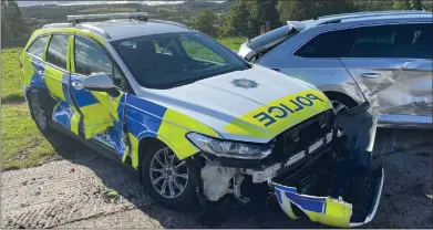  ?? ?? PSNI cars showing some of the damage allegedly caused by the accused.