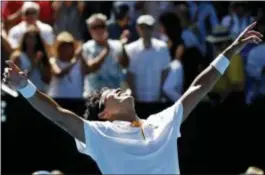  ?? NG HAN GUAN — THE ASSOCIATED PRESS ?? Chung Hyeon celebrates after defeating Tennys Sandgren in quarterfin­als at the Australian Open on Wednesday. the